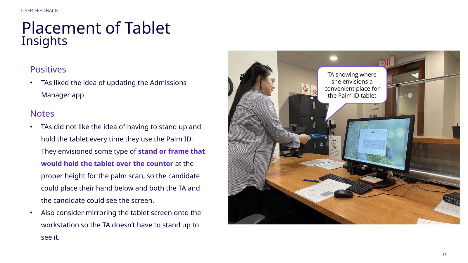 Test administrator demonstrating preferred tablet placement at the station